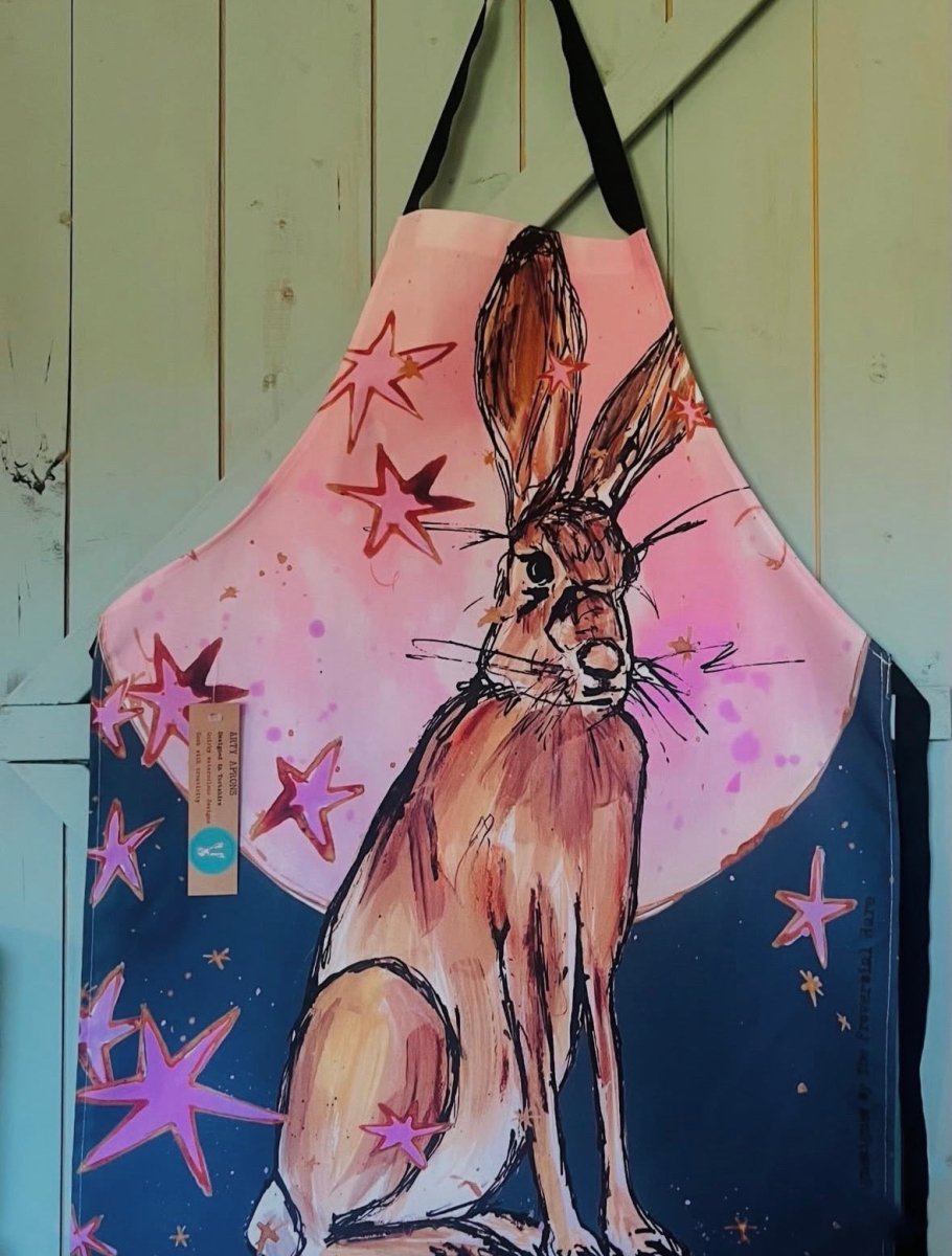 Apron with a rabbit design on a pink and blue background