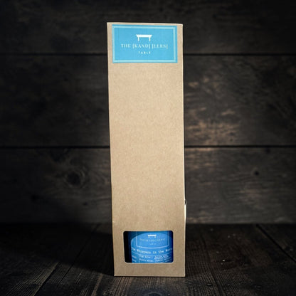Kraft paper packaging with blue labels on a wooden background