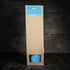 Kraft paper packaging with blue labels on a wooden background