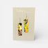 Colorful earrings on a Nancy Jones branded card