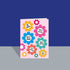 Pink card with colorful flowers and Yorkshire phrases on a blue background