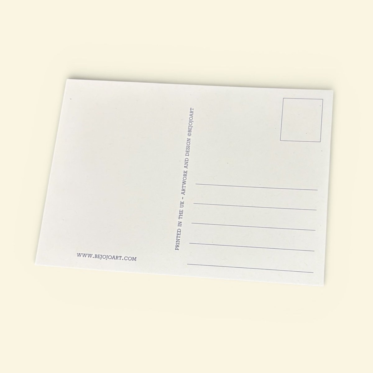 White postcard with text on a beige background