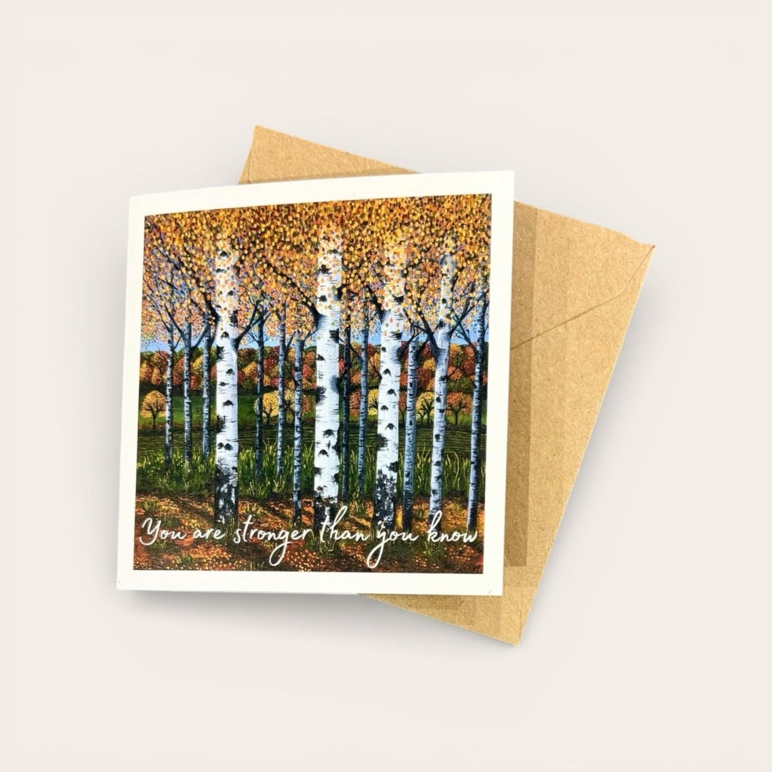 Greeting card with birch tree design and motivational quote on a white background